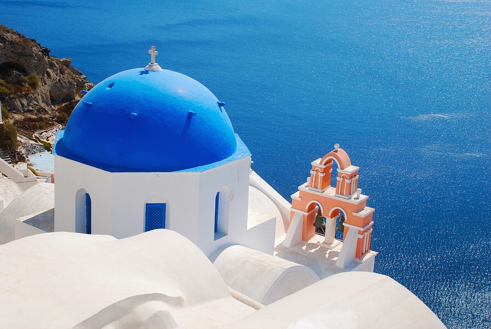 Santorini, kubushuisje met blauw dak Santorini, kubushuisje met blauw dak